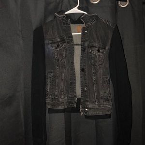 Black denim jacket with cotton sleeves and hood